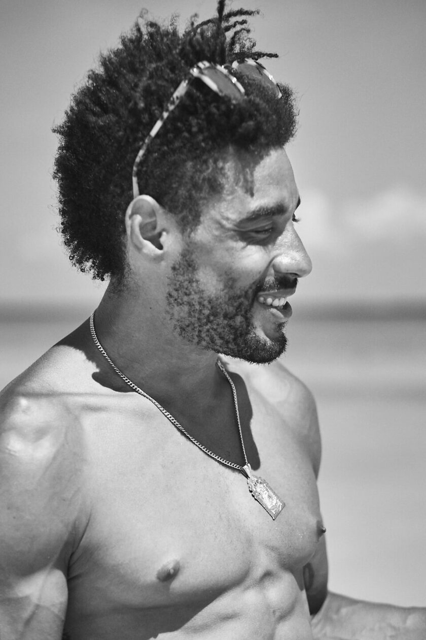Fuji X Pro2 with xf 56mm f1.2 - Model smiling on the beach. Playa del Carmen, Mexico - Model: Marquis