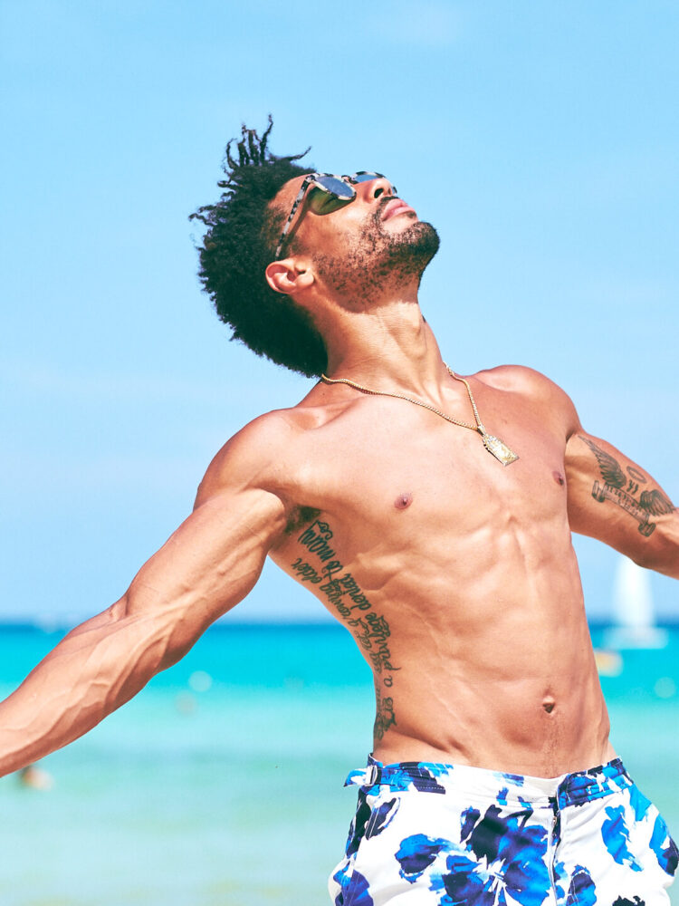 Fuji X Pro2 with xf 56mm f1.2 - Model wearing sunglasses on the beach. Playa del Carmen, Mexico - Model: Marquis