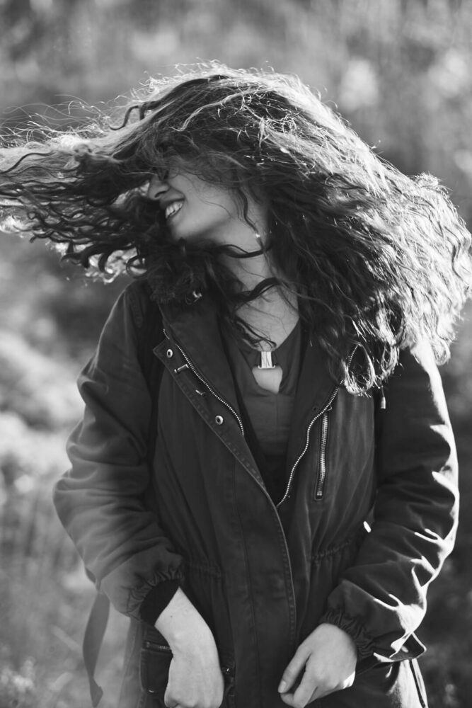 Fuji X Pro2 with xf 56mm f1.2 - Black and White Portrait Photography in Brooklyn New York around Prospect Part. Woman with glasses and a smile - Model: Andrea