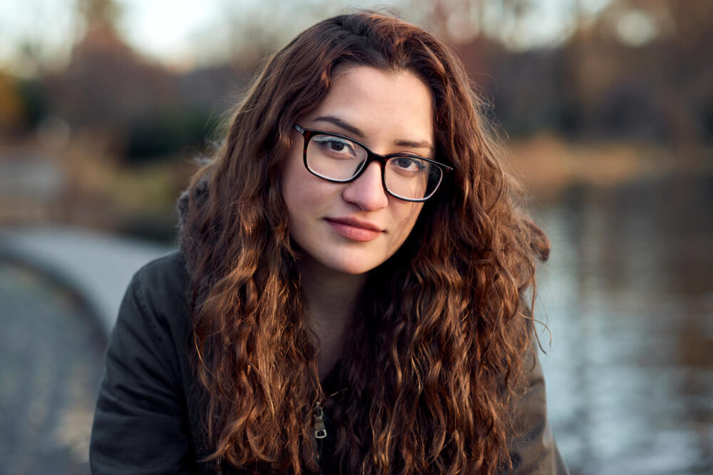 Fuji X Pro2 with xf 56mm f1.2 - Portrait Photography in Brooklyn New York around Prospect Part. Woman with glasses in a coffee shop - Model: Andrea