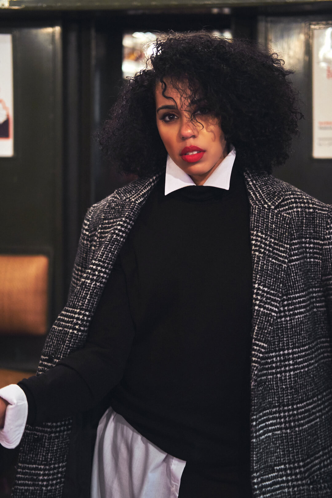 Fashion Photography Poses - Editorial Photography Portrait - MTA Transit Museum of New York - Model Poses - Jes Perez - Woman in pea coat and red heels - Fuji X Pro2 with Fujinon xf 35mm f2