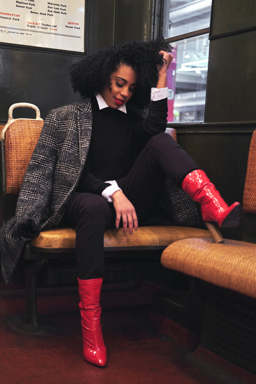 Fashion Photography Poses - Editorial Photography Portrait - MTA Transit Museum of New York - Model Poses - Jes Perez - Woman in pea coat and red heels - Fuji X Pro2 with Fujinon xf 35mm f2