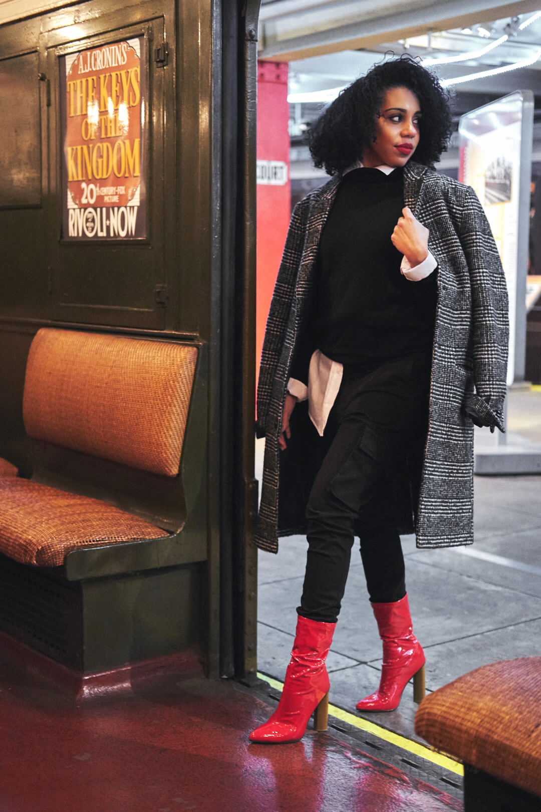 Fashion Photography Poses - Editorial Photography Portrait - MTA Transit Museum of New York - Model Poses - Jes Perez - Woman in pea coat and red heels - Fuji X Pro2 with Fujinon xf 35mm f2