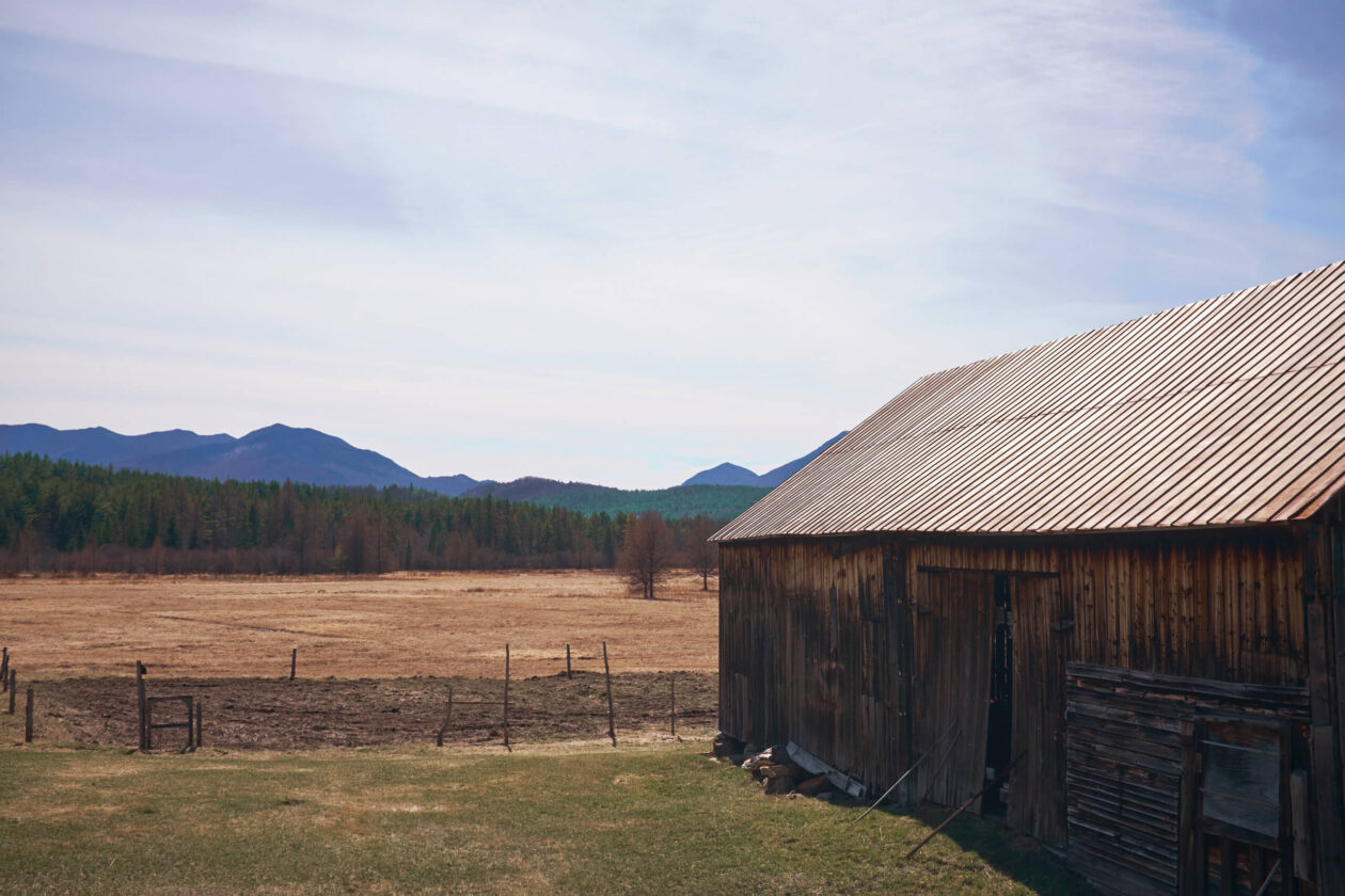 FujiFilm X100T - Landscape Photography at Lake George New York mountainside road trip with a cabin in the foreground
