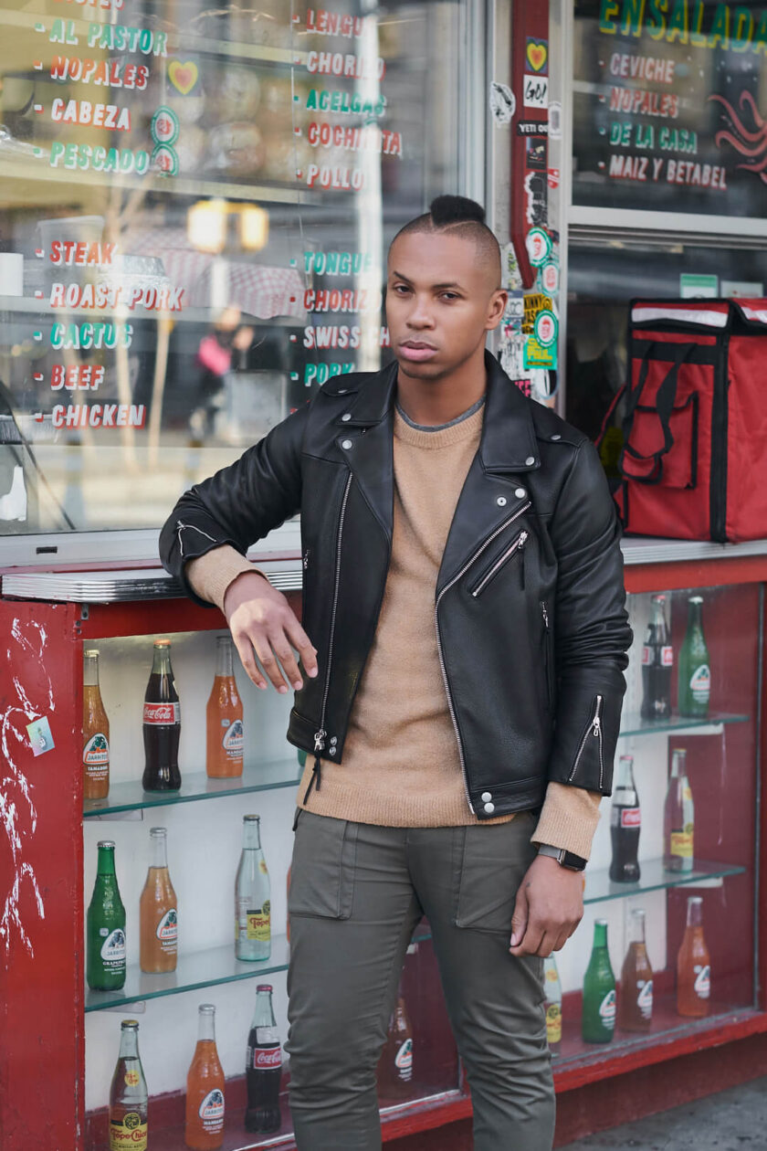 Fuji X Pro2 with xf 56mm f1.2 - Frank and Oak Men's Fashion Photography in SoHo New York with male standing next to restaurant store front - Model: Rashad